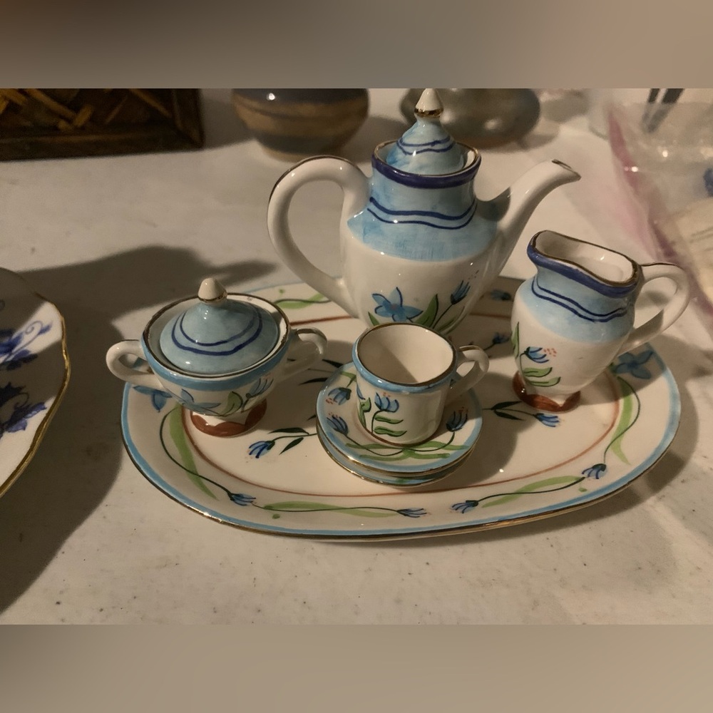 a miniature porcelain tea set in the "Blue Bows" pattern,